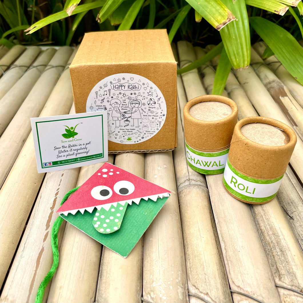 Cute Monster: Kids 3-in-1 Bookmark Plantable Rakhi with Roil Chawal Combo