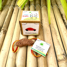 Load image into Gallery viewer, Car: Clay Rakhi with a Chocolate and Roil Chawal Combo
